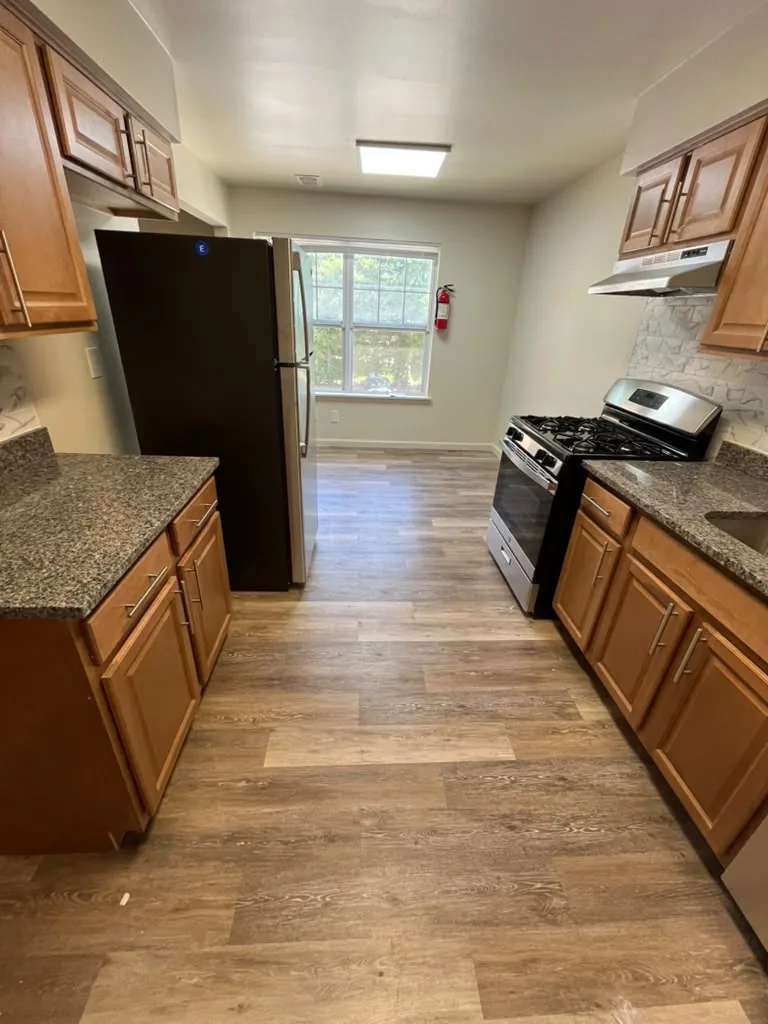 Compact bathroom with vanity and shower