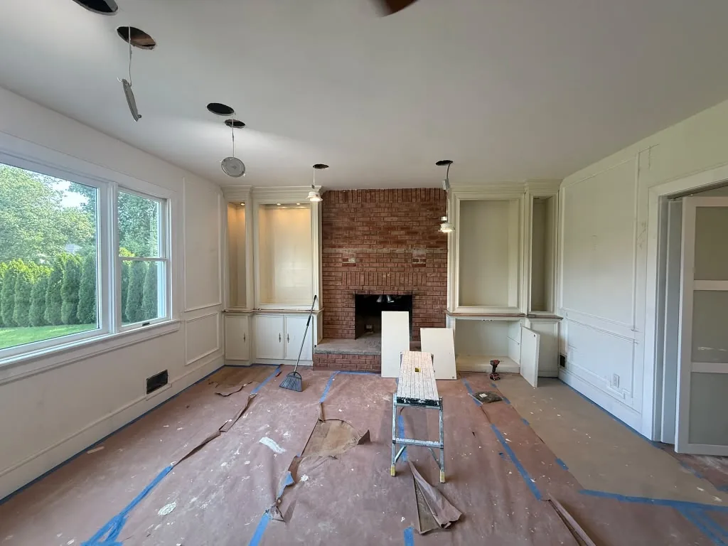 Living room masked and prepped before fine finish painting